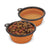 Orange silicone collapsible travel pet bowl, showing two, one filled with food and the other with water